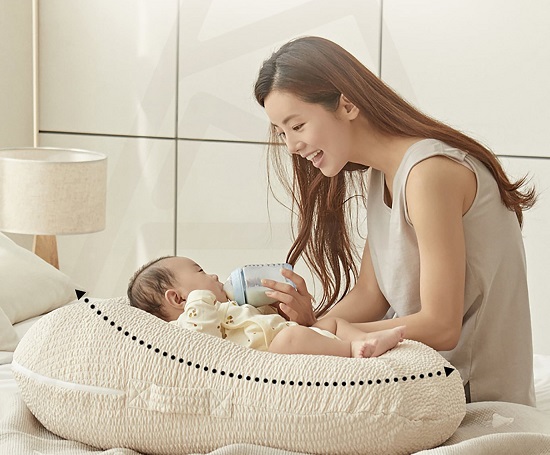 Nằm gối chống trào ngược có bị gù lưng không