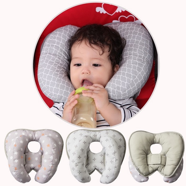 goi-giu-cho-be-tren-ghe-xe-o-to-1